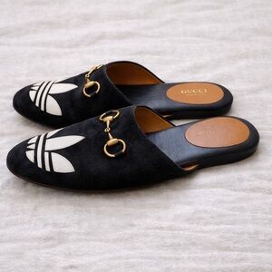 Gucci Black and White Women's Mules with Gold Detail